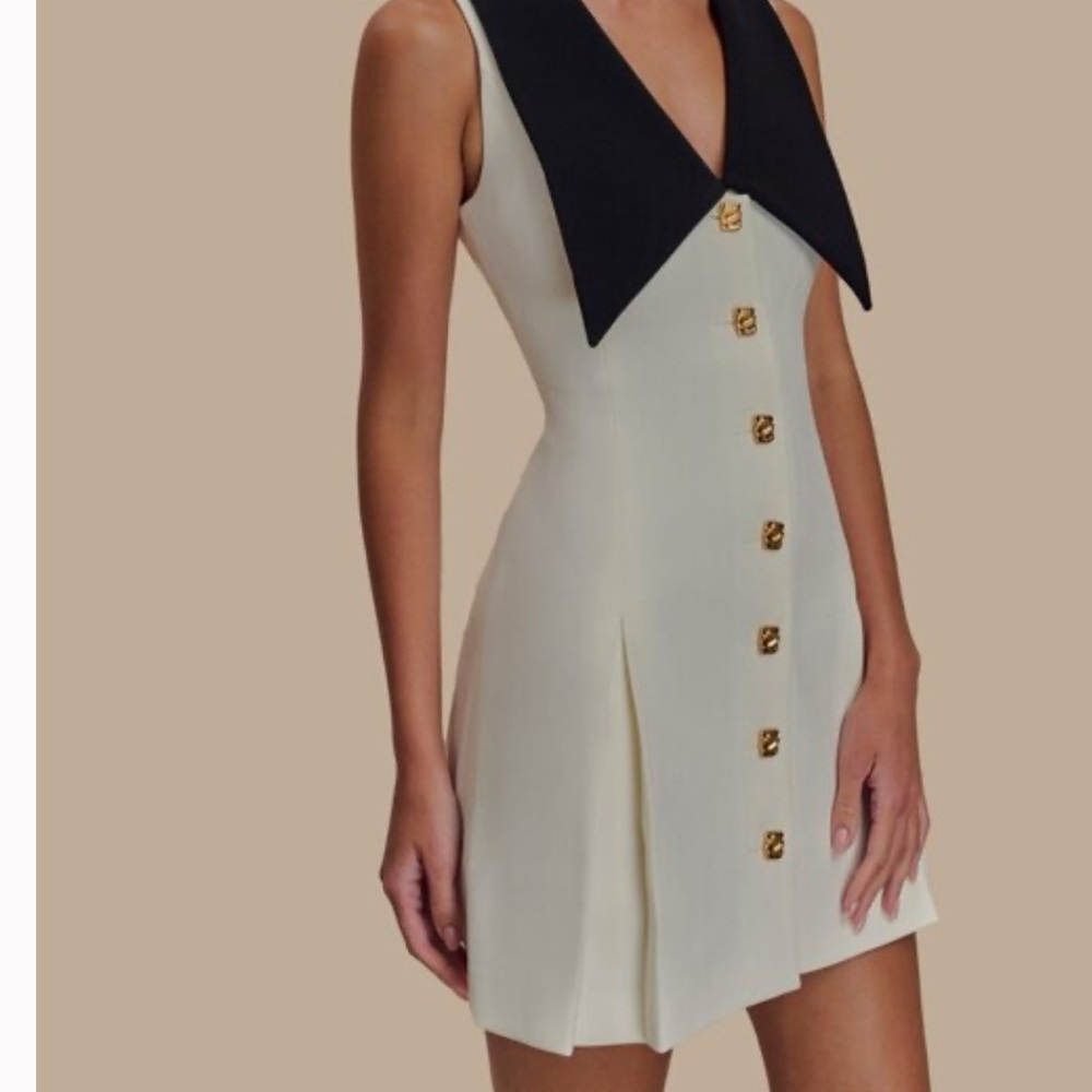 Elegant Cream Dress with Black Collar